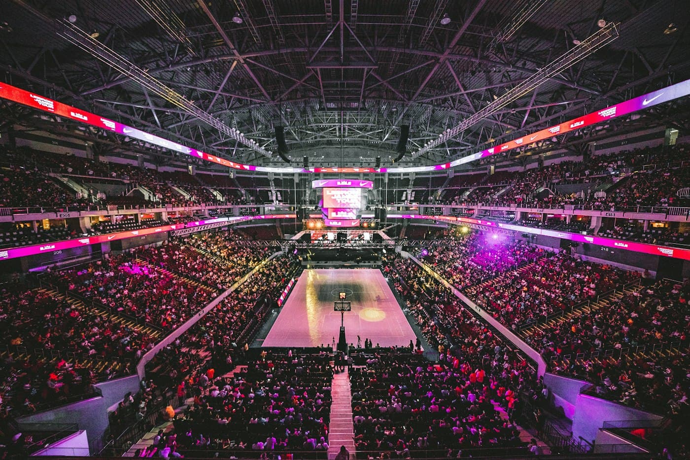 Indoor sports arena under match lights